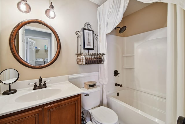 bathroom featuring shower / bathtub combination, toilet, and vanity