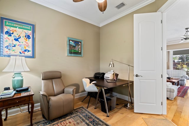 office with hardwood / wood-style flooring, ornamental molding, and ceiling fan