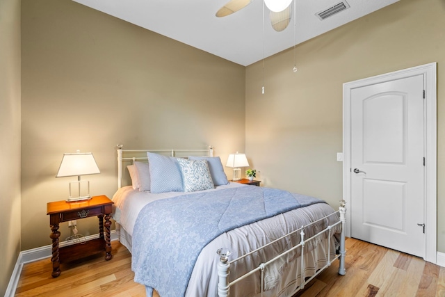 bedroom featuring ceiling fan and light wood-type flooring