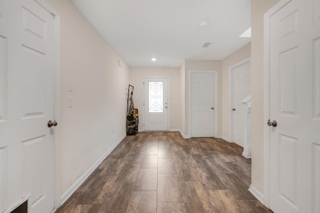 entrance foyer with dark hardwood / wood-style flooring