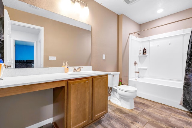 full bathroom featuring toilet, vanity, and shower / bathtub combination with curtain