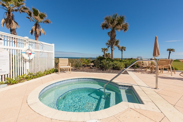 view of swimming pool featuring a patio area