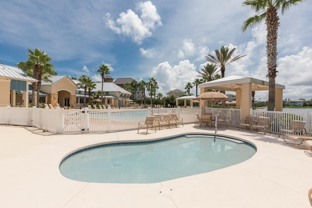 view of pool featuring a patio