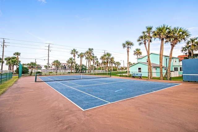 view of sport court featuring basketball hoop