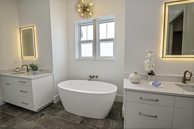 bathroom featuring vanity and a bathing tub