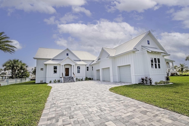 modern farmhouse style home with a front yard