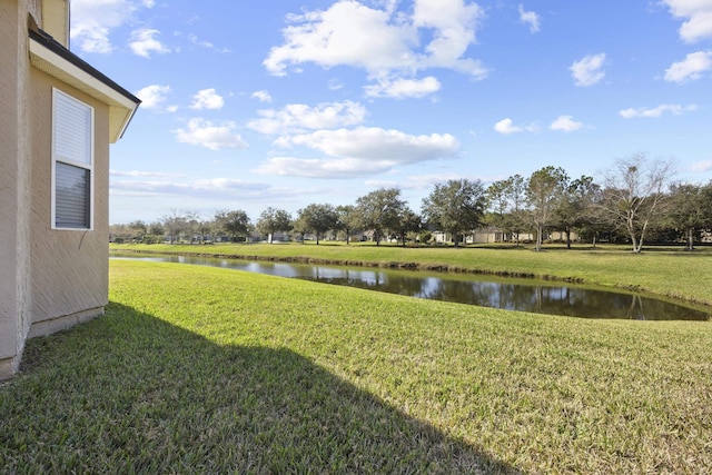 view of yard with a water view