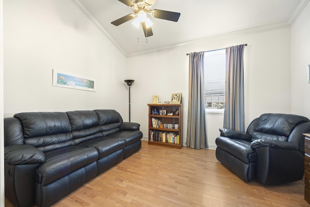 living room with light hardwood / wood-style flooring, ceiling fan, and ornamental molding