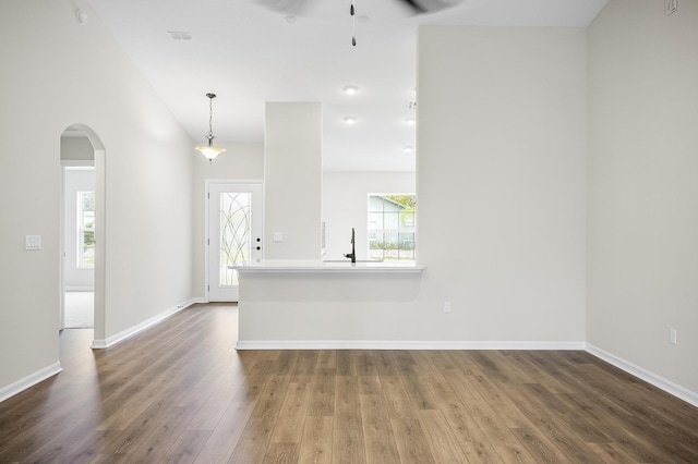 interior space featuring hardwood / wood-style flooring and ceiling fan