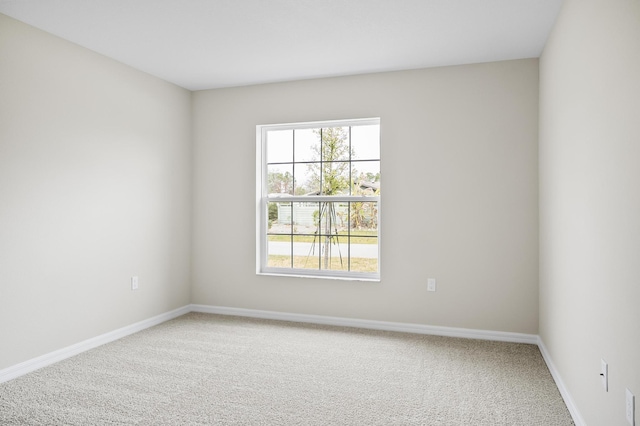 view of carpeted spare room