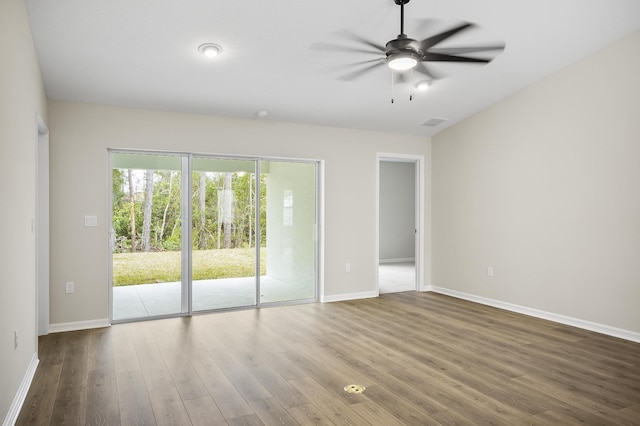 unfurnished room featuring hardwood / wood-style flooring and ceiling fan