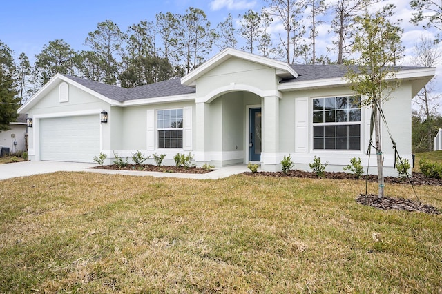 single story home with a garage and a front yard