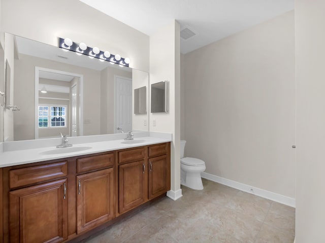 150 Pantano Cay Blvd Unit 2303, Saint Augustine, FL 32080 - full bath featuring double vanity, toilet, and baseboards