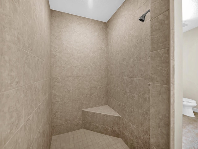 150 Pantano Cay Blvd Unit 2303, Saint Augustine, FL 32080 - bathroom featuring a tile shower and toilet