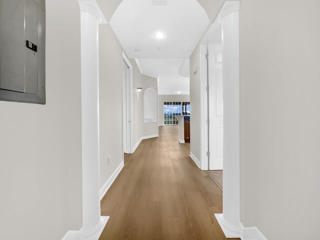 150 Pantano Cay Blvd Unit 2303, Saint Augustine, FL 32080 - hall with electric panel, wood finished floors, baseboards, and decorative columns
