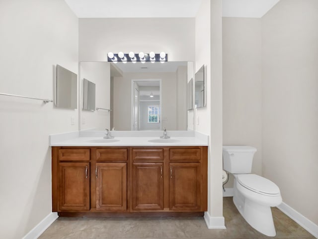 150 Pantano Cay Blvd Unit 2303, Saint Augustine, FL 32080 - bathroom with toilet, double vanity, and baseboards