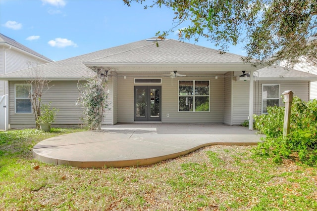 rear view of property with a patio, ceiling fan, and french doors