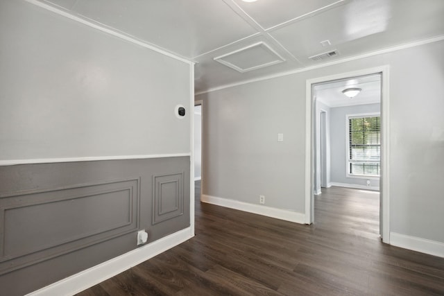 unfurnished room with dark hardwood / wood-style floors and ornamental molding