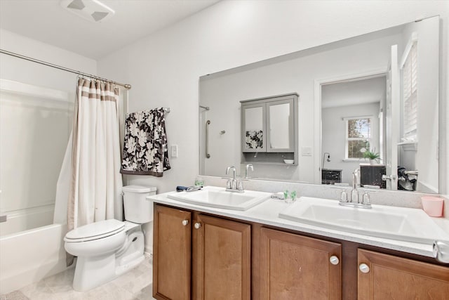 full bathroom featuring vanity, tile patterned flooring, shower / bath combination with curtain, and toilet