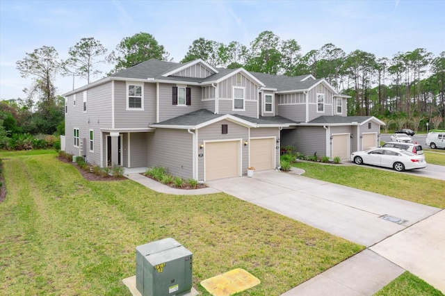 view of front of property featuring a garage and a front lawn