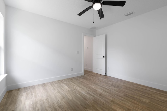 461 S Woodlawn St, Saint Augustine, FL 32084 - unfurnished room with wood finished floors and a ceiling fan