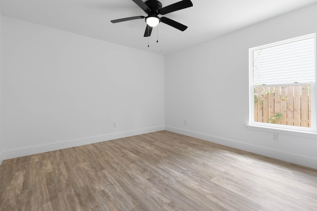 461 S Woodlawn St, Saint Augustine, FL 32084 - empty room with wood finished floors and a ceiling fan