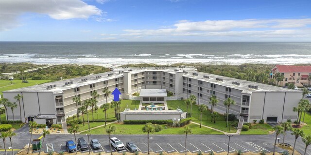 aerial view with a beach view and a water view