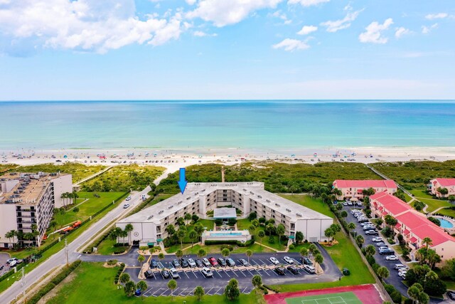 aerial view with a view of the beach and a water view