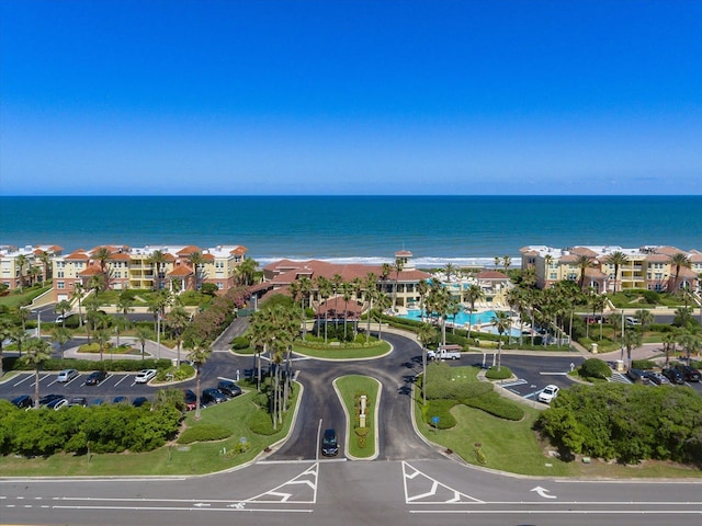 aerial view with a residential view and a water view