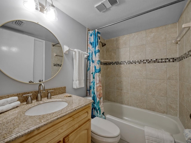 full bathroom featuring shower / bathtub combination with curtain, vanity, and toilet