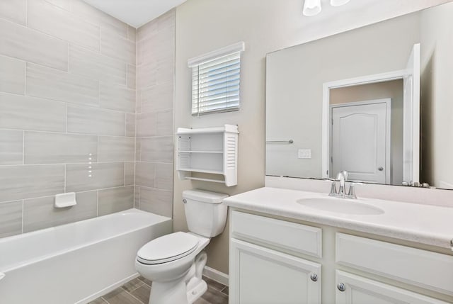 full bathroom with toilet, tub / shower combination, wood finished floors, and vanity