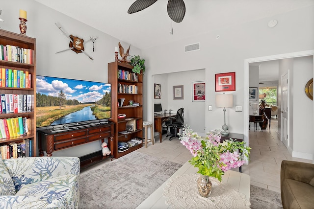 1602 Windjammer Ln, Saint Augustine, FL 32084 - living area with a desk, a ceiling fan, and tile patterned flooring