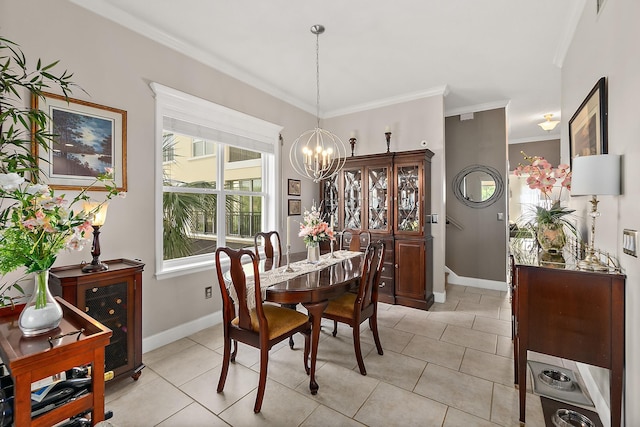 tiled dining room with an inviting chandelier and ornamental molding