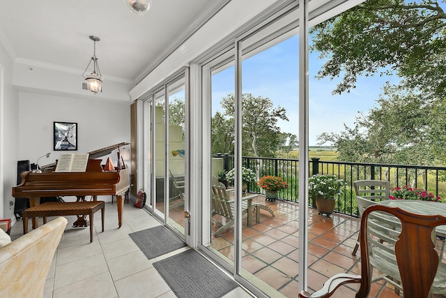 1602 Windjammer Ln, Saint Augustine, FL 32084 - entryway with light tile patterned floors and ornamental molding