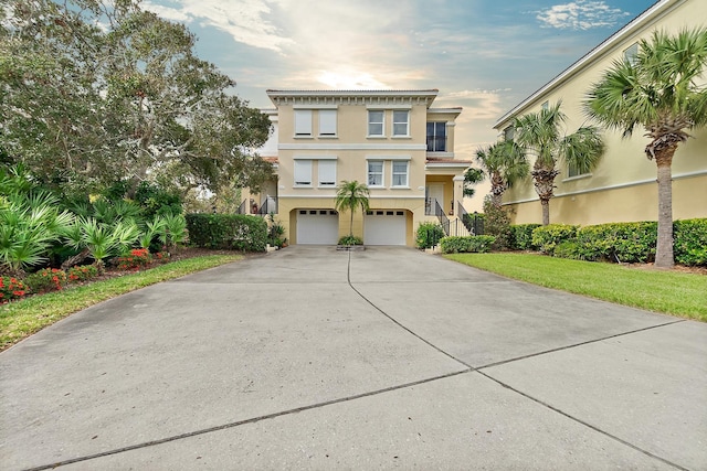 view of front of property featuring a garage