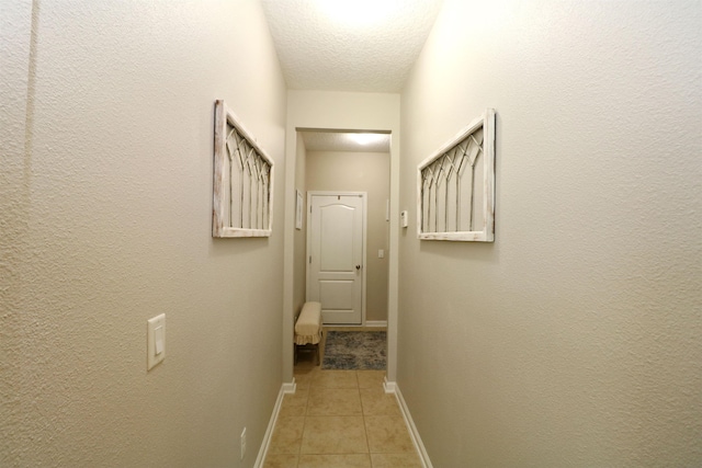 326 Gianna Way, Saint Augustine, FL 32086 - hall featuring light tile patterned floors and a textured ceiling