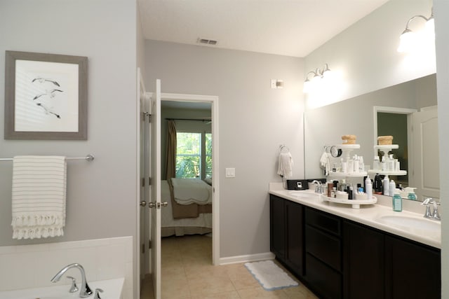 326 Gianna Way, Saint Augustine, FL 32086 - full bathroom with double vanity, ensuite bathroom, tile patterned flooring, and a bath