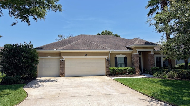 326 Gianna Way, Saint Augustine, FL 32086 - view of front of home featuring stone siding, stucco siding, a garage, and concrete driveway