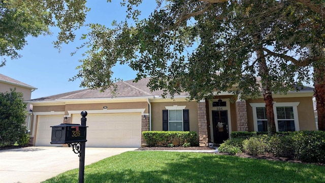 326 Gianna Way, Saint Augustine, FL 32086 - ranch-style house with stucco siding, driveway, an attached garage, stone siding, and a front yard