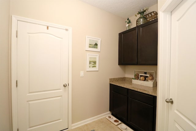 326 Gianna Way, Saint Augustine, FL 32086 - washroom with a textured ceiling and light tile patterned flooring