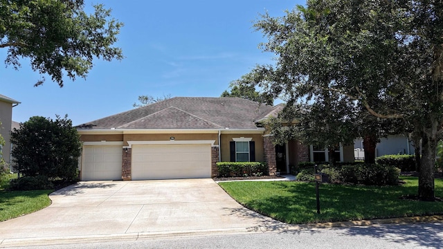 326 Gianna Way, Saint Augustine, FL 32086 - single story home featuring stucco siding, an attached garage, concrete driveway, a front lawn, and stone siding