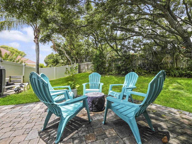 304 1st St, Saint Augustine, FL 32084 - fenced backyard with a patio area