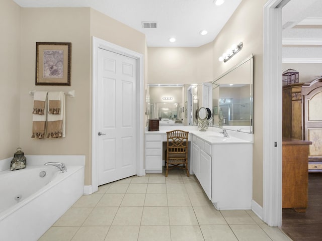 304 1st St, Saint Augustine, FL 32084 - full bath with vanity, a garden tub, tile patterned flooring, and recessed lighting