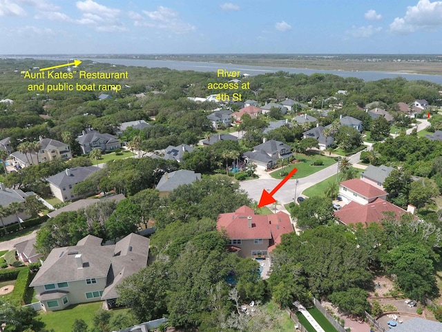 304 1st St, Saint Augustine, FL 32084 - aerial view of property and surrounding area featuring nearby suburban area and a nearby body of water