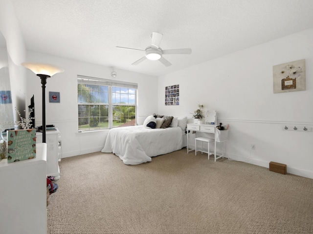304 1st St, Saint Augustine, FL 32084 - bedroom featuring carpet floors, a ceiling fan, and a textured ceiling