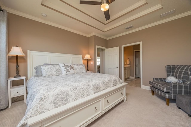 bedroom with ornamental molding, a raised ceiling, and ceiling fan