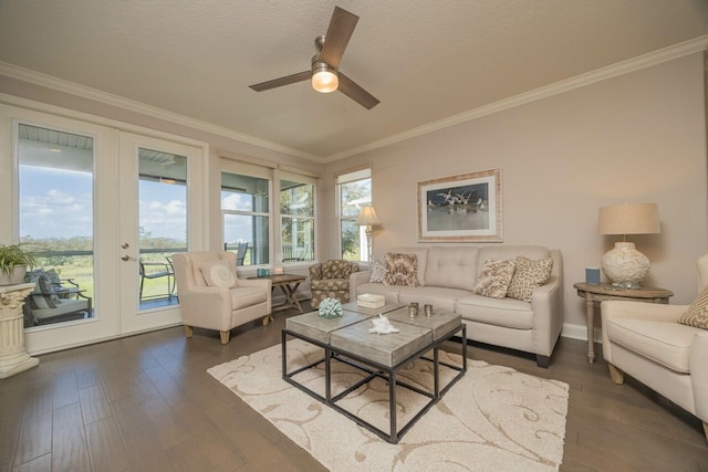 living room featuring french doors, crown molding, a textured ceiling, hardwood / wood-style flooring, and ceiling fan