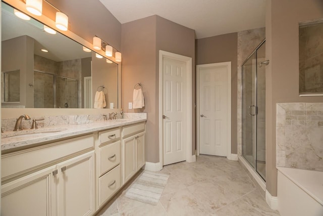 bathroom with vanity and an enclosed shower