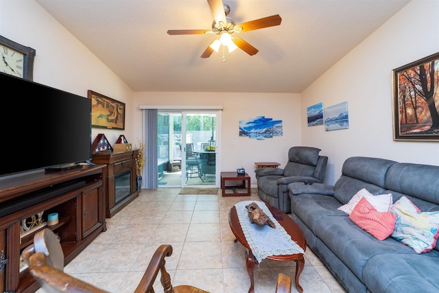 142 Patriot Ln, Elkton, FL 32033 - living room with a ceiling fan, vaulted ceiling, and light tile patterned floors