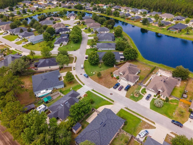 142 Patriot Ln, Elkton, FL 32033 - aerial overview of property's location with nearby suburban area and a nearby body of water